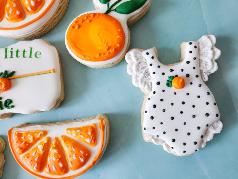 Mommy to be little cutie  on the way baby shower gender neutral reveal party boy or girl orange fruit color baby carriage cookies oranges
