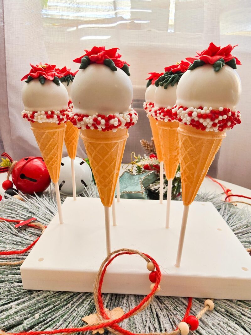 Poincettia christmas cake pops red green icecream cones detailed annyversary cake pop on a stand individually wrapped - Image 2