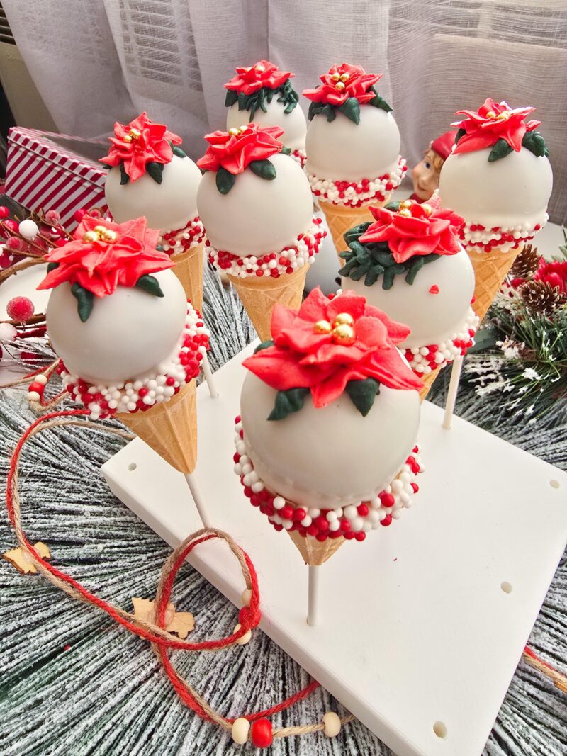 Poincettia christmas cake pops red green icecream cones detailed annyversary cake pop on a stand individually wrapped - Image 3