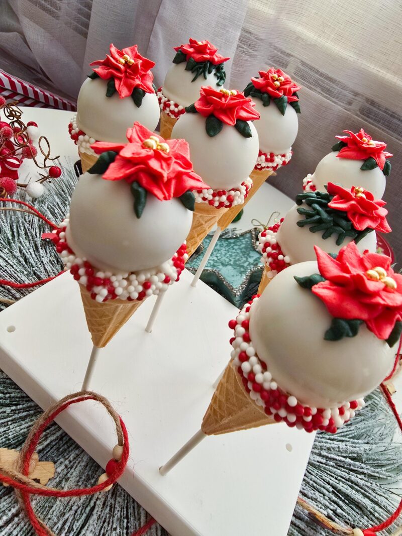 Poincettia christmas cake pops red green icecream cones detailed annyversary cake pop on a stand individually wrapped - Image 5