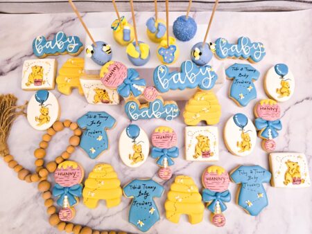 Winnie the pooh baby shower reveal party it's  a boy or girl blue pink biege yellow  pastel colors honey funny onesie bees  cookies