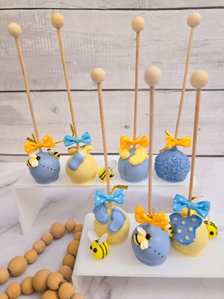 Cake pops  Winnie the pooh honey and bee winnie the pooh  mommy to be bee reveal party baby shower annyversary cake pop on a stand