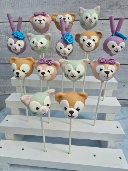Cake pops Duffy and friends honey anniversary birthday party baby shower  cake pop on a stand
