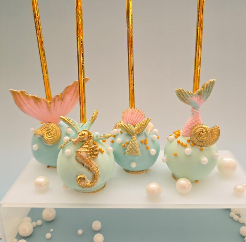 Mermaid tail shell seahorse dive into themed cake pops baby shower birthday anniversary reveal party best cakepops blue tile gold colors